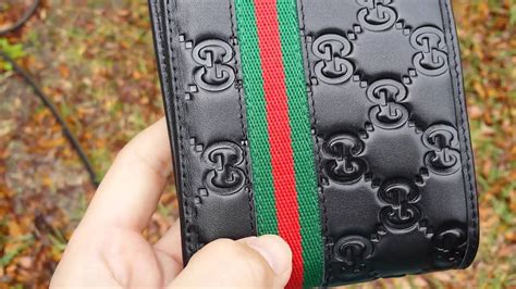 men fake gucci wallet metal|real gucci men's wallet.